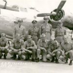 Crew of  B-24H 42-94841 â€˜Sack Time!’ beside B-24J, 95911 ‘Lucky Strike’